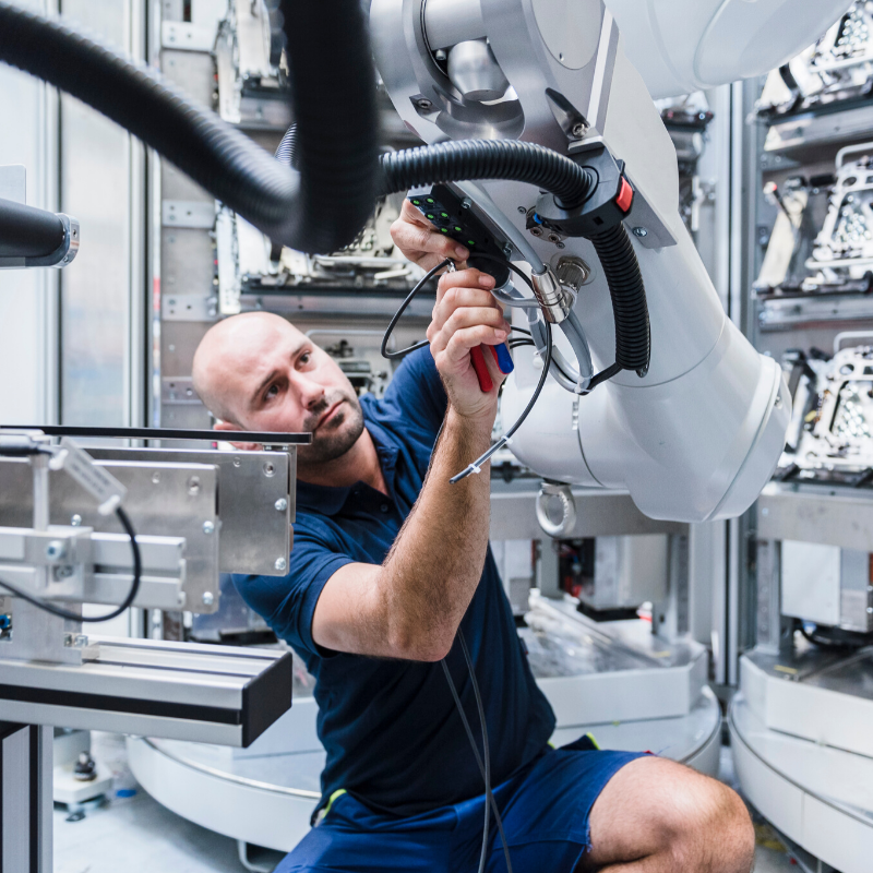 Man working in robotics lab